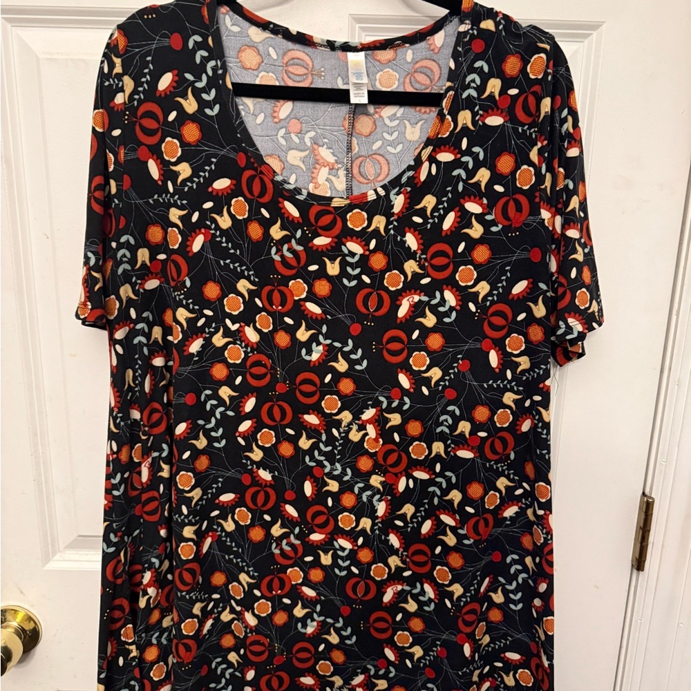 LuLaRoe Black Short Sleeve Scoop Neck Top with Orange Floral Motif